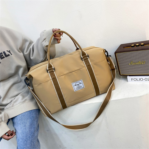 New short-distance business trip travel bag, women's large-capacity shoulder hand-held luggage bag for maternity, can be placed in a trolley suitcase luggage bag
