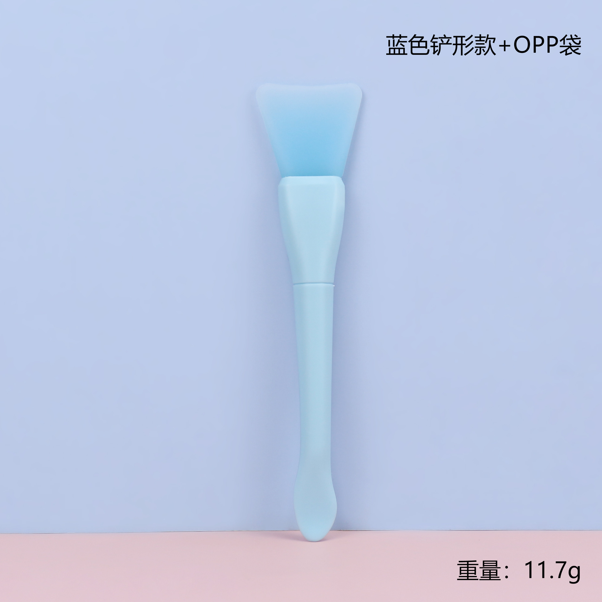 Shovel-shaped fishtail spoon mask brush blue + opp transparent bag