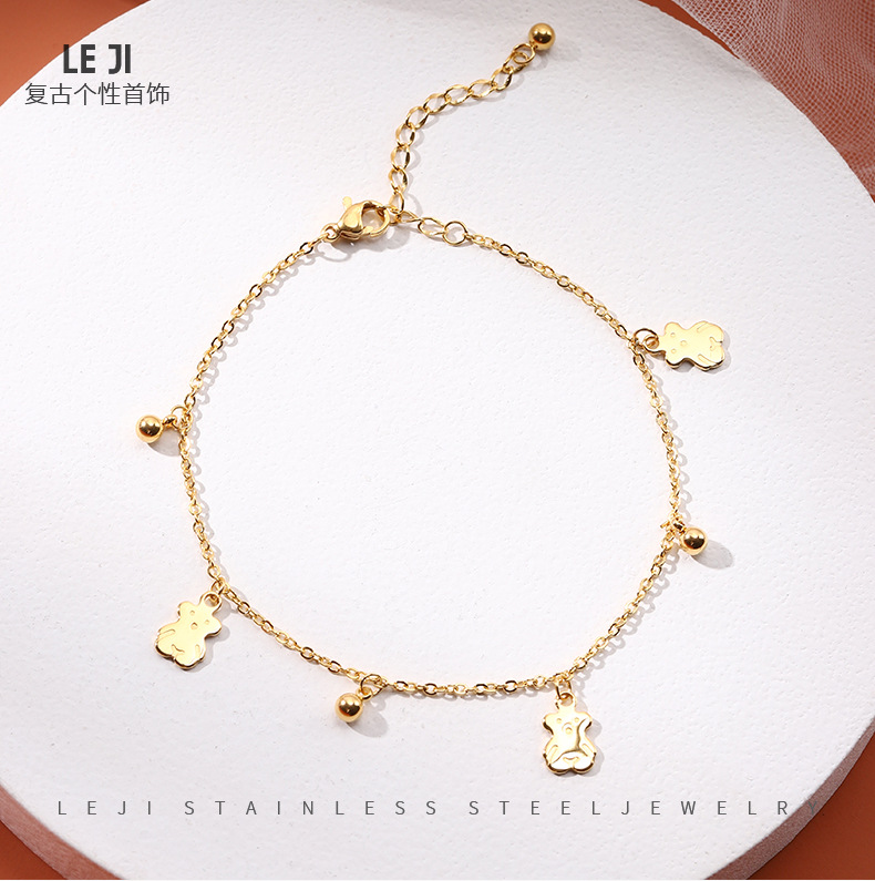 JL-0121: Pooh oso elegante oro