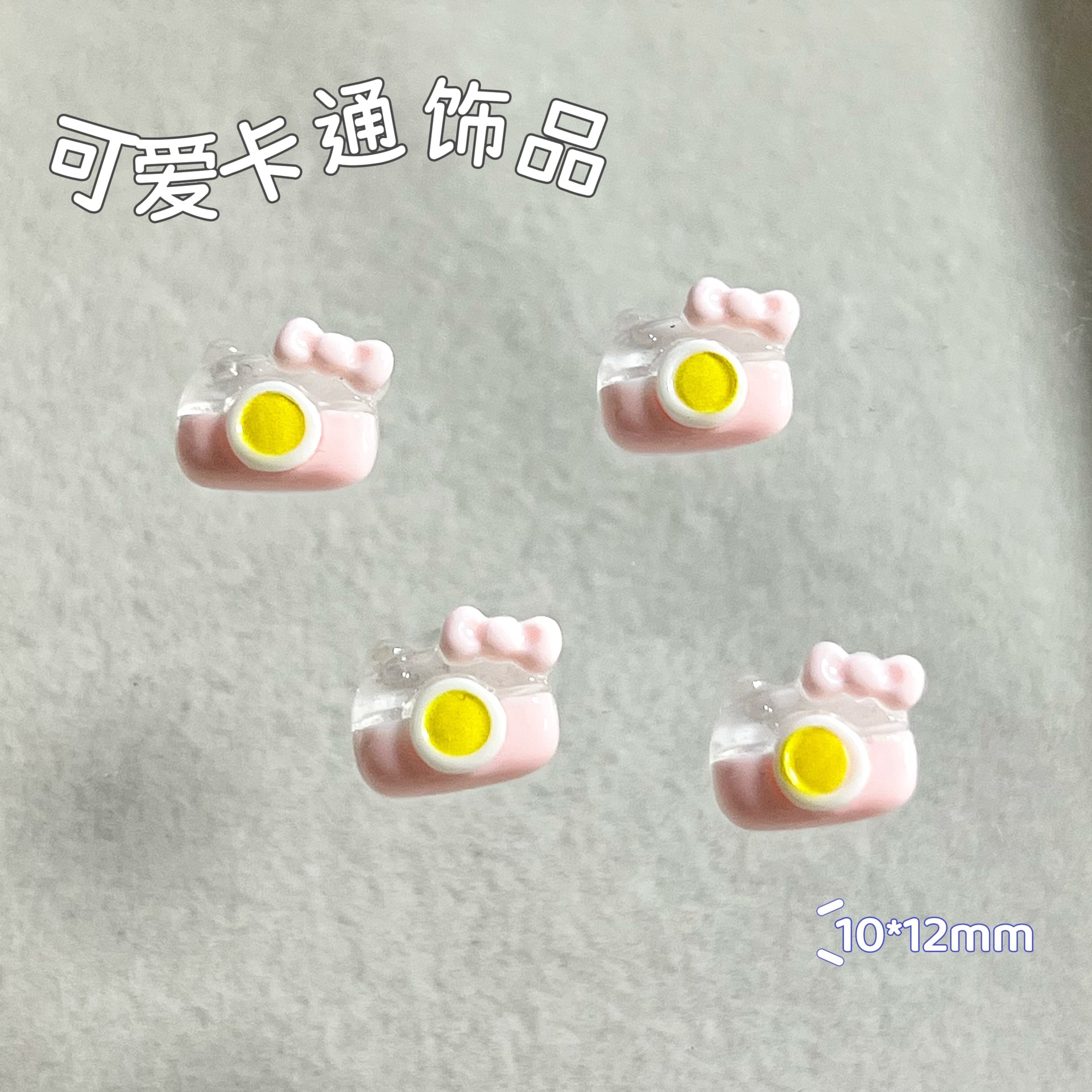 新商品のキティキャットの三麗鴎のネイルアクセサリーのネットの赤い爆発の樹脂のかわいいkt猫は甲を着て飾ります。