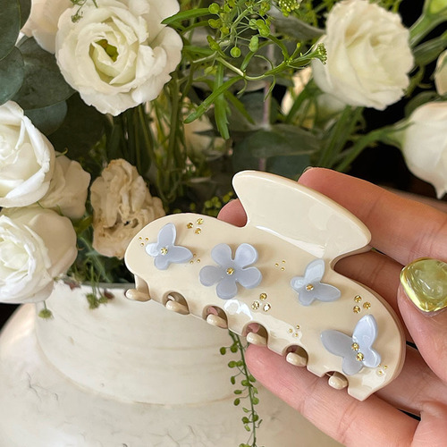 Korean blogger-style delicate, fresh, and three-dimensional hair clips: butterfly and flower designs with full rhinestone accents—perfect for the back of the head, featuring a sleek shark clip design.