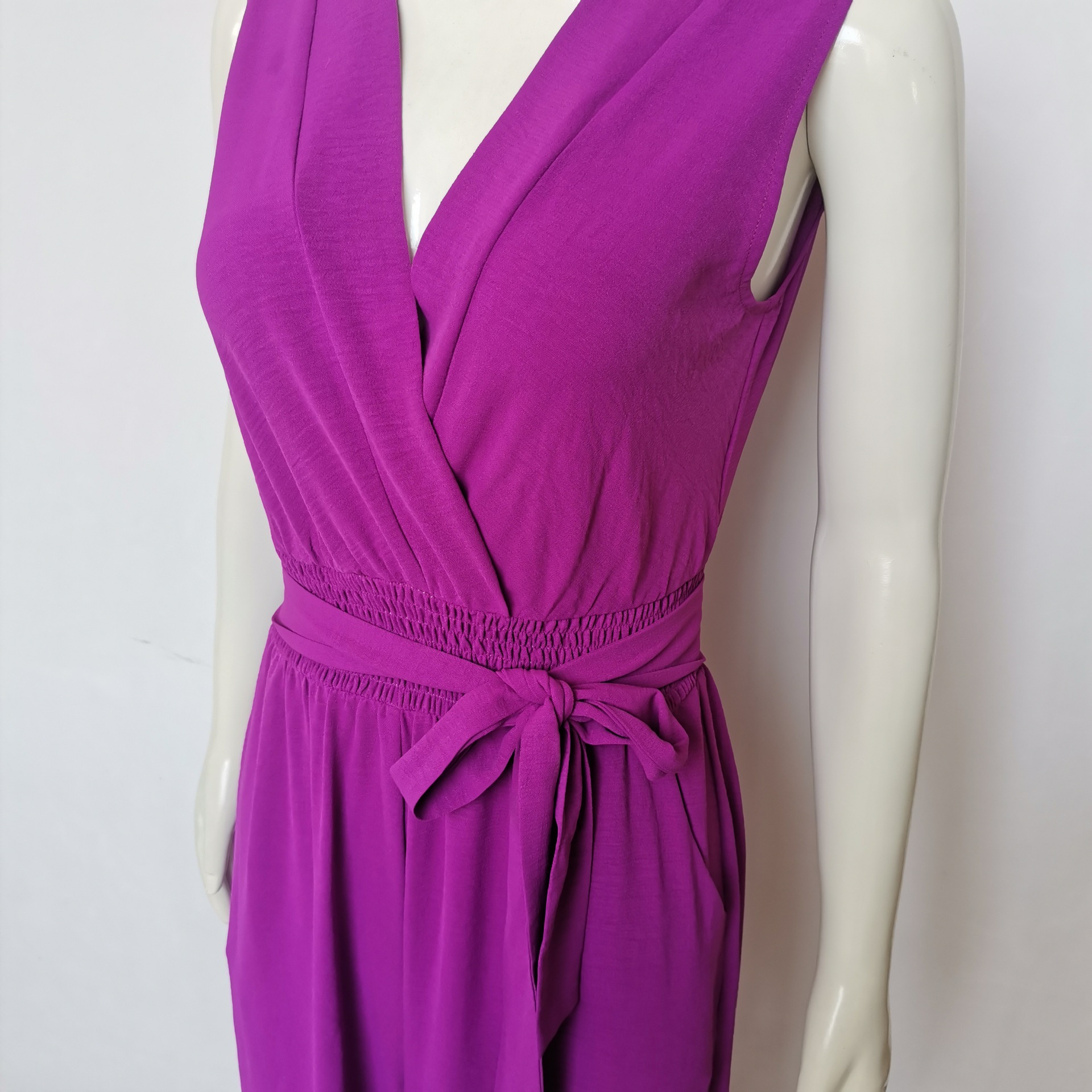 Ropa de mujer europea y americana 2024 primavera nuevo color sólido con cuello en V sin mangas con cordones cintura alta suelta pierna ancha Pantalones de mujer