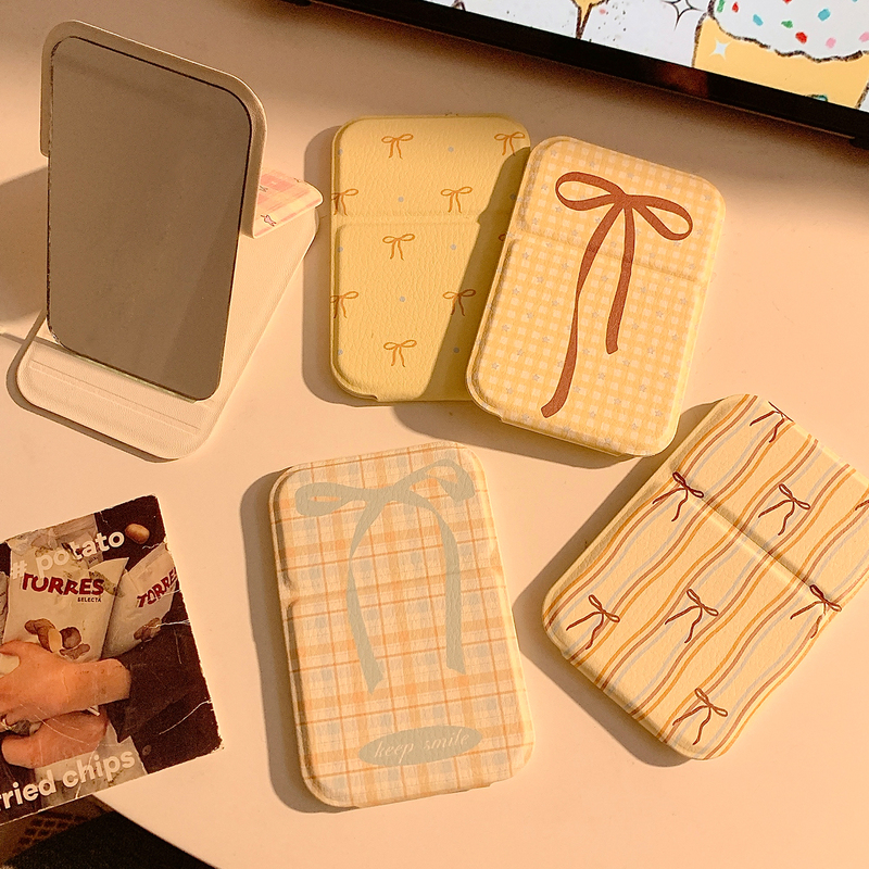 Highly stylish portable folding mirror with bow design, ins-style travel compact mirror, desktop mirror, makeup mirror Highly stylish portable folding mirror with bow design, ins-style travel compact mirror, desktop mirror, makeup mirror