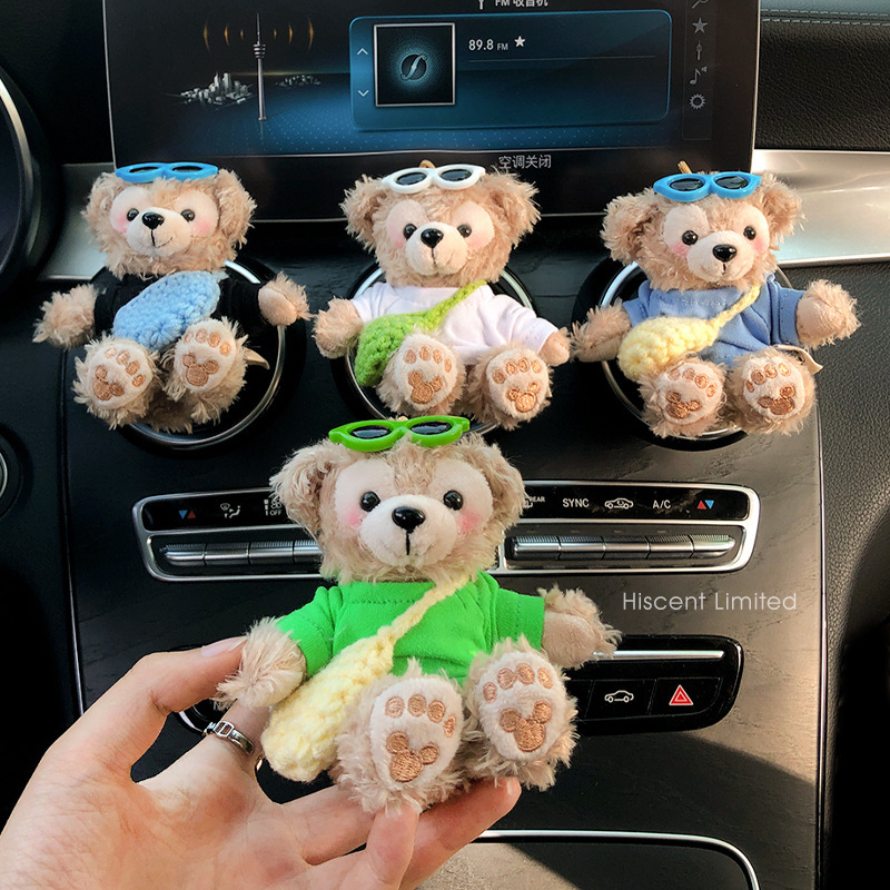 2025 nuevo coche muñeca oso de felpa Tamiflu coche aromaterapia de salida de aire decoración interior accesorios de coche decoración mujer