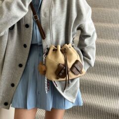 复古磨砂包包斜挎包女时尚小众单肩包百搭简约抽绳水桶包跨境外贸