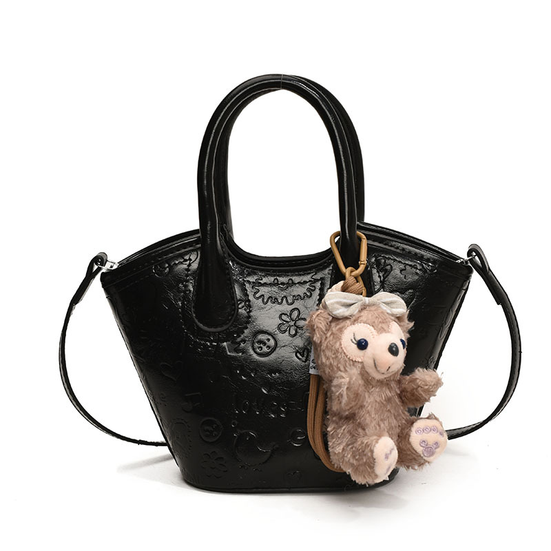 Nicho coreano bolsas de cesta de verduras de mano primavera de mujeres 2025 nueva moda encantadora bolsa en relieve bolsas de mochila