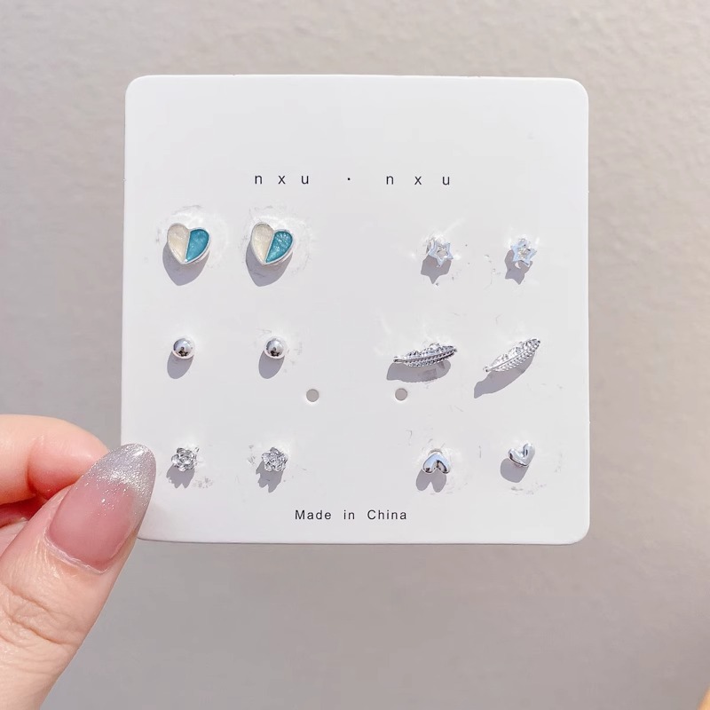 Pendientes de aro lisos para mujer, lujo ligero, pendientes de alta gama, pendientes populares, aretes de diseño exclusivo, aretes de otoño e invierno al por mayor