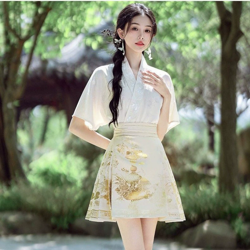 Новый летний асимметричный женский топ с вышивкой в ​​китайском стиле и короткой плиссированной юбкой и комплектом юбки из парчи с лошадиной мордой.