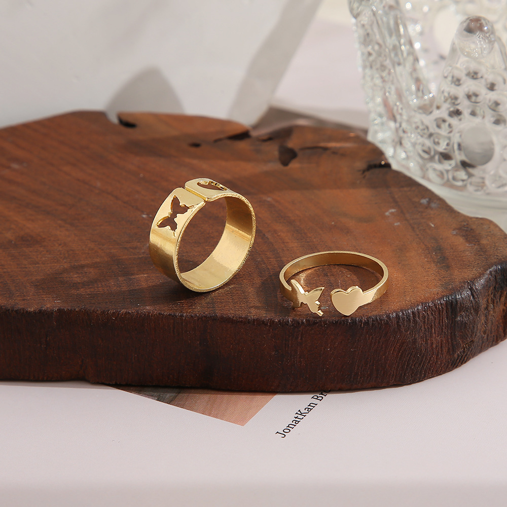 fashion geometric hollowed heart butterfly shaped alloy rings two piece set wholesale