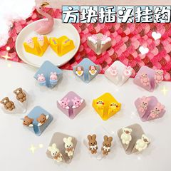 Cartoon square plug hook without punching and strong sticking multifunctional hook power socket head storage holder