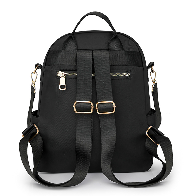 Mochila con remaches bordados de ringge para mujer 2025 nueva bolsa de viaje de moda casual todo-fósforo de gran capacidad para mujer