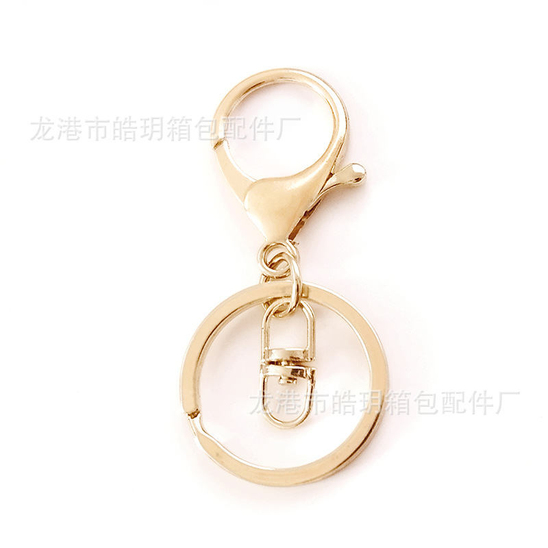 メーカーが提供しているロブスターボタンのキーホルダーは亜鉛合金部品の金属スプリングフックで、犬ボタンのフラットリングです。|undefined