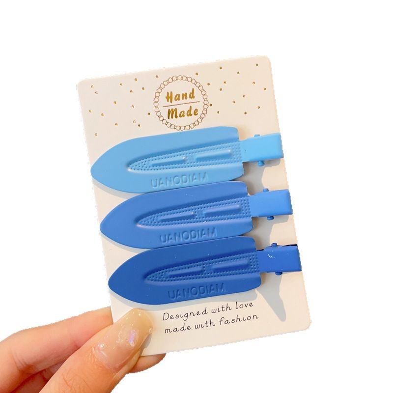 Klein azul clip para el cabello de la mujer alta sensación de cejas cortadas clip lateral sin marcas de maquillaje clip para el cabello de cabeza clip para el cabello