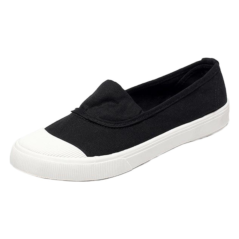 Primavera nuevos zapatos de lona de un solo pedal de fondo plano para hombres y mujeres parejas pequeños zapatos blancos para estudiantes de todo fósforo zapatos perezosos coreanos moda