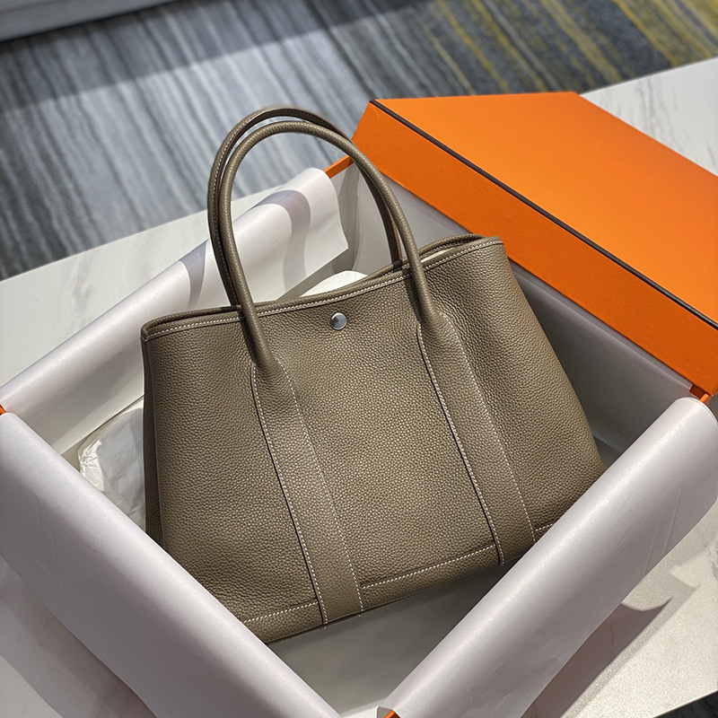 2023 Nueva bolsa de mensajero de hombro de las mujeres de cuero genuino bolso de mano bolsa de jardín portátil bolsa grande bolsa de compras bolsa de cubo