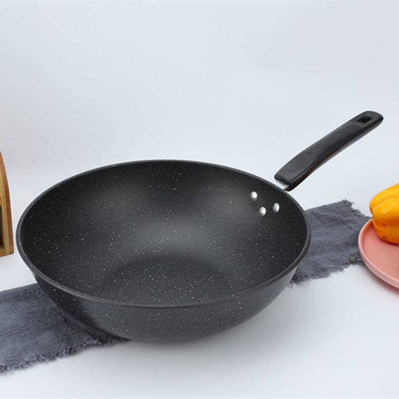 Suministro directo de fábrica de hierro wok hogar no recubierto sartén antiadherente Cocina de Inducción estufa de gas aplicable al por mayor