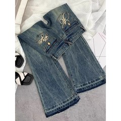 アメリカのレトロな腰の小さいラッパのジーパンの女性の刺繍は古いファッションをします。