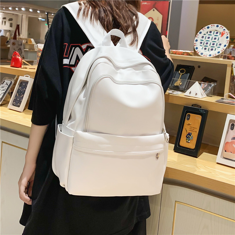 Koreanisches lässiges PU-Leder für Modetrend, britischer High-School-Studentenrucksack, wasserdichter Herrenrucksack_voghion.com