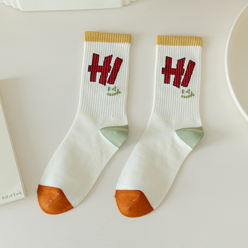 Algodón peinado Smiley calcetines deportivos calcetines a juego de colores calcetines de hombre Otoño e Invierno calcetines de marea blanca de algodón de color sólido mediados de la pantorrilla