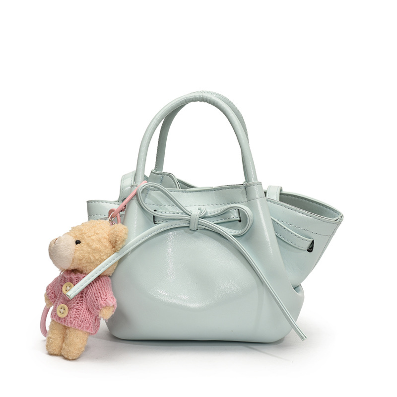 Nicho de diseño coreano bolsas de canasta de verduras para mujeres 2025 nueva moda bolsas de cubo de alta calidad bolsas de hombro