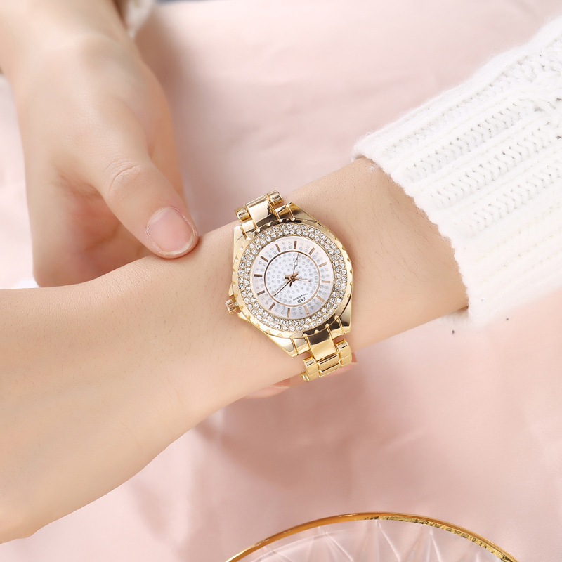 Nuevo reloj estudiante temperamento simple moda de negocios femeninos Reloj de cuarzo cinturón de acero estrellado incrustado con diamantes