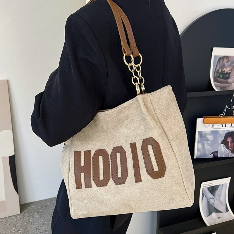 Clase de estudiante universitario bolsa de lona de un solo hombro bolsa grande de gran capacidad para mujeres 2023 Nueva bolsa de viaje de textura avanzada