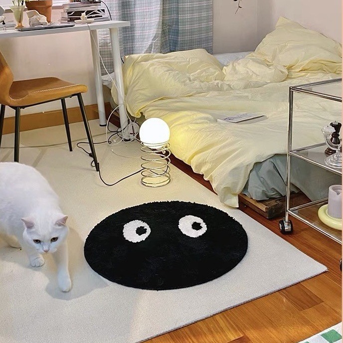 Transfronterizo lindo negro alfombra redonda dormitorio cabecera casa alfombra ins creativo pequeña alfombra de cara negra