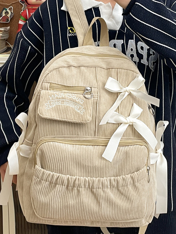 コーデュロイ中学高校の学生はランドセル学校のins風の甘い蝶結びの大容量の韓国版のかばんを合わせます。|undefined