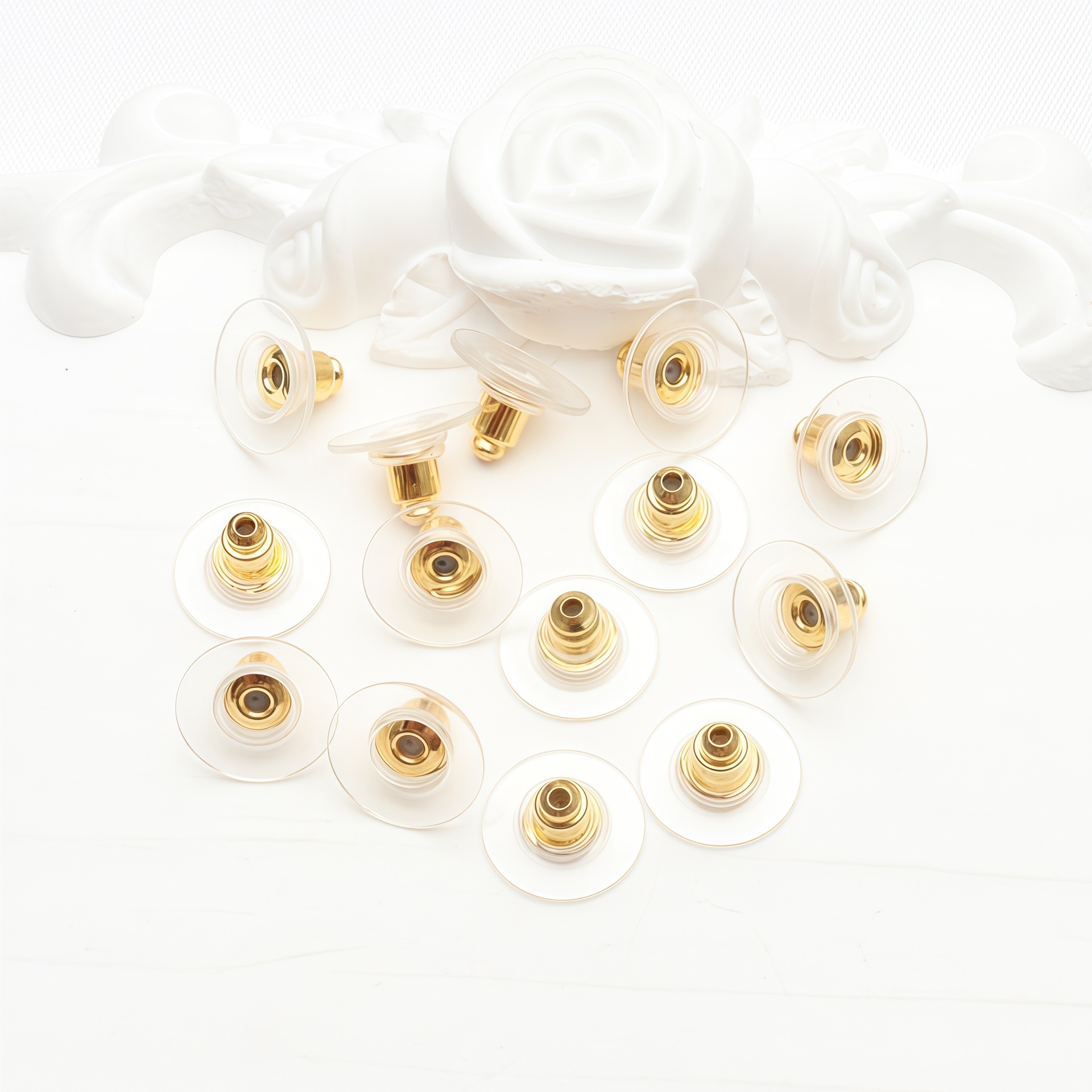 Golden dice, bullet, earplugs