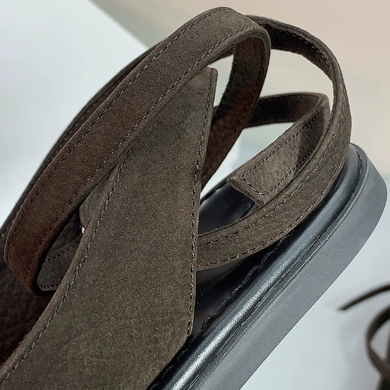 European station flat-sole wrapping belt Roman sandals the outside wear genuine leather open-toe clip flip-flops vacation sandals trend