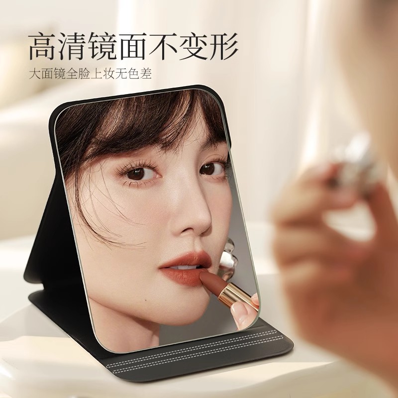 Espejo de maquillaje portátil de viaje de mujer plegable pequeño espejo de mano dormitorio de estudiantes espejo plegable mini espejo para hombre