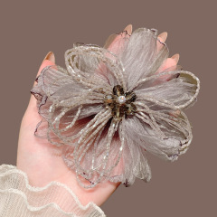 軽くて豪華な手作りの水晶の花のスプリングは気質を挟んで優雅です。
