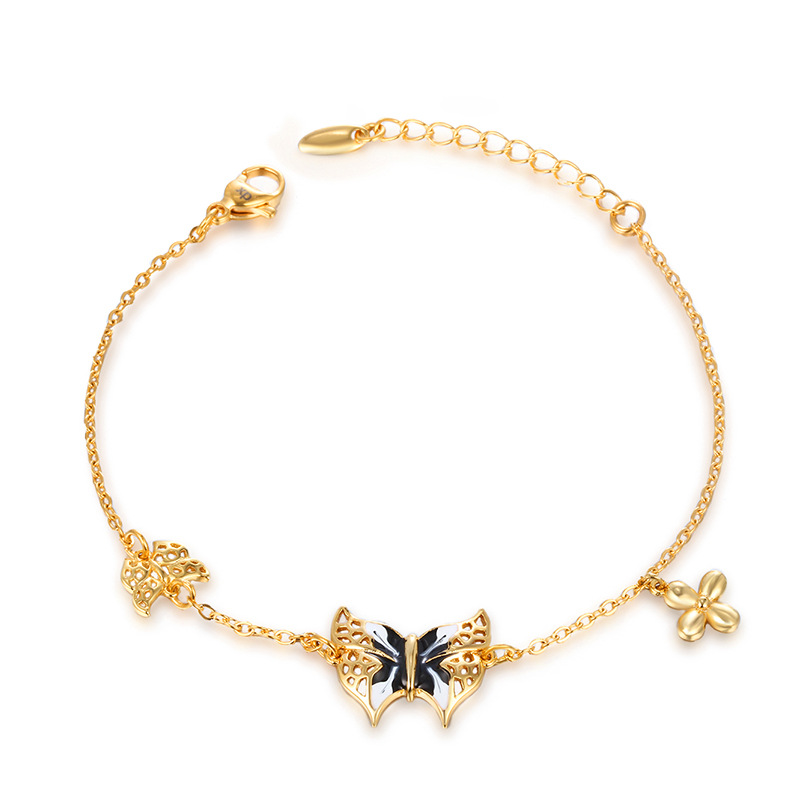 Xuping aleación de cobre dorado esmalte goteo de aceite pulsera mariposa mujer retro lujo ligero nicho diseño de alta sensación joyería