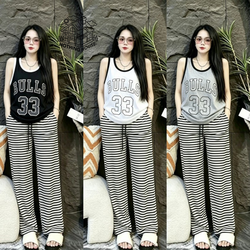 Southeast Asian letter-print sleeveless top and wide-leg striped pants, a casual and relaxed two-piece women's outfit Southeast Asian letter-print sleeveless top and wide-leg striped pants, a casual and relaxed two-piece women's outfit