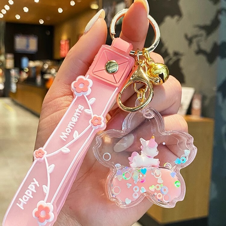 Online celebrity cherry blossom unicorn car key pendant floating quicksand liquid key chain cute girl exquisite gift