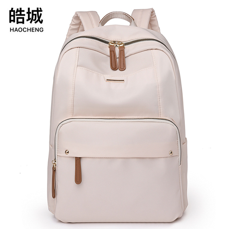 2024 nueva mochila casual para mujer de nailon, color sólido simple, mochila para computadora de gran capacidad, mochila de viaje ligera