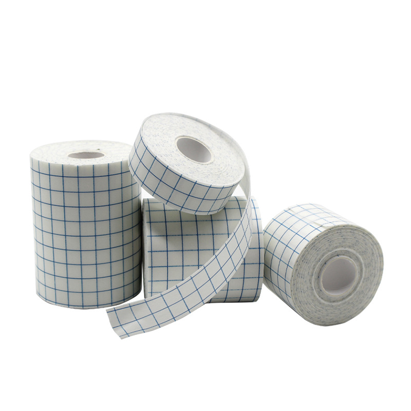 Fábrica al por mayor pegatinas de vestir fuerte adhesivo vendaje spunlace no tejido transpirable rollo de vestir pegatinas impermeables