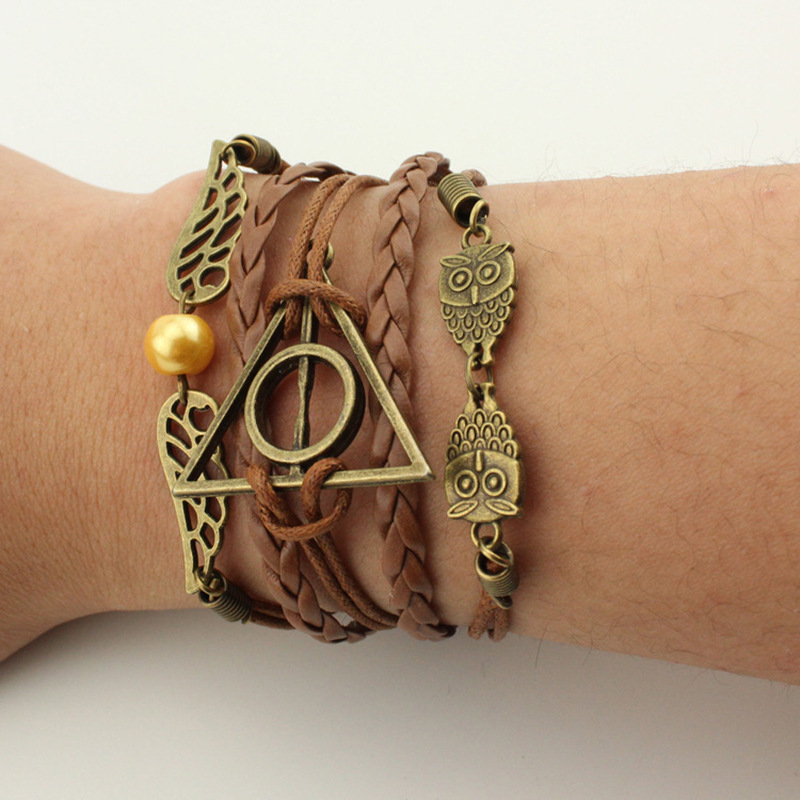 Cross-border Europe and the United States New Joker Owl Wings Pearl Triangle Harry Potter Angel Wings Bracelet Wholesale