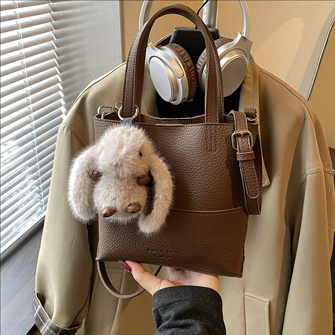 Bolso de cubo de mano coreano, bolso de hombro para mujeres extranjeras 2025, nuevo estilo de alta calidad, simple bolso de transporte