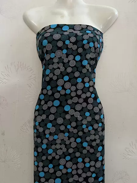 Blue -green and white dot