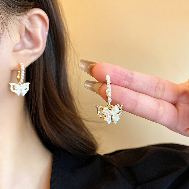 1 Pair Simple Style Classic Style Bow Knot Inlay Alloy Rhinestones Drop Earrings display picture 1