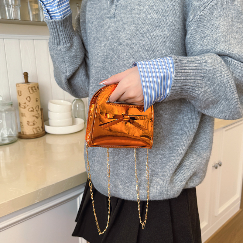 Bolsa de cadena de laca de moda brillante, dulce y lindo, bolso de arco para niñas, bolso para niños de color sólido