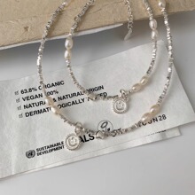 s925纯银新心吊坠笑脸项链女轻奢小众设计天然淡水珍珠碎银子颈链