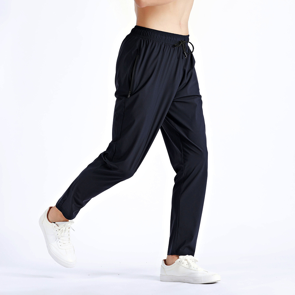 Pantalones deportivos de hombre para correr Fitness rápido secado respirado con cremallera bolsillo suelto gran tamaño de nylon hielo pantalones de cintura alta