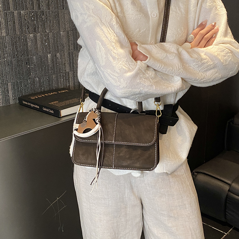 Bolso retro mate 2026 nuevo nicho Zhong viaje bolso de hombro bolso de mochila universal bolso de moda empalmado bolso