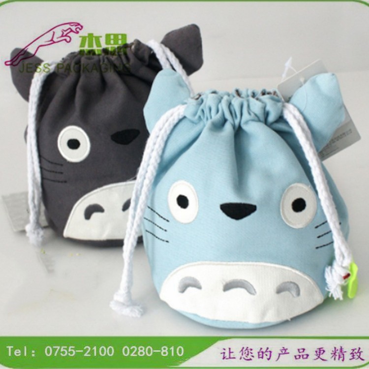 设计新款棉布卡通可爱萌龙绣花玩具收纳包大容量手机杂物束口袋