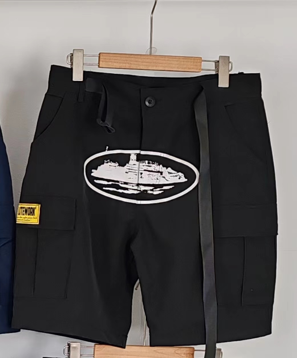 Retro americano de alta calle de bolsillo crucero impresión de herramientas pantalones cortos hombres marca de moda de verano pantalones cortos de herramientas sueltos hombres