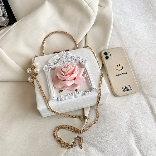 Cross-border new women's bag retro baroque relief angel flower portable chain bag niche shoulder crossbody bag