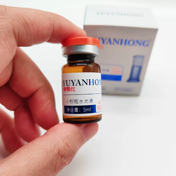 Small Brown Bottle of Rejuvenating and Brightening Essence for Home Use, Can Be Applied with a Gene Gun to Brighten and Rejuvenate Skin