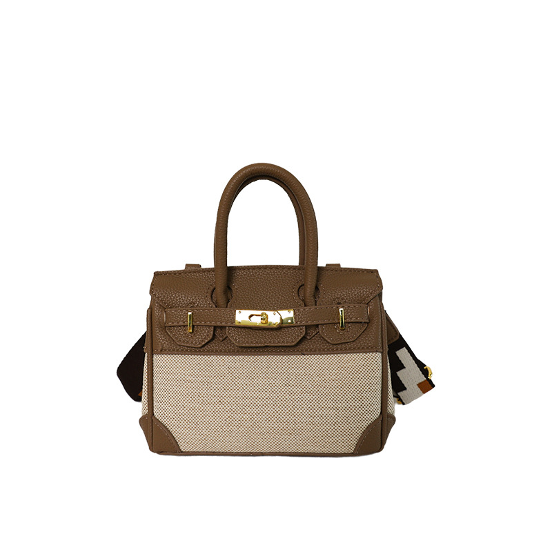 Cross-border nuevo bolso portátil de platino para mujeres 2026 moda lino empalme color contraste mochila de hombro